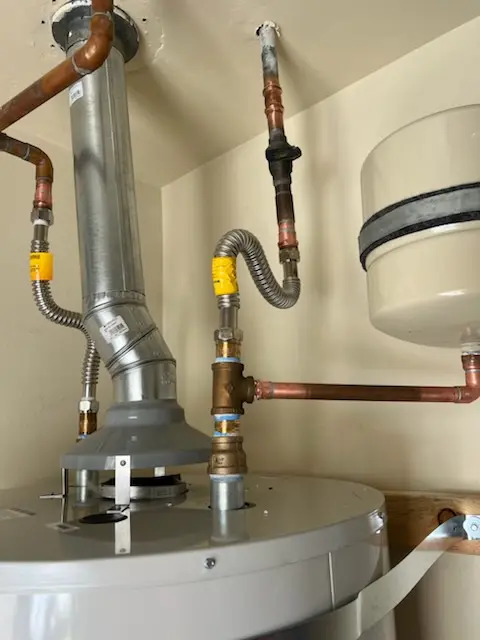 Water heater installation and plumbing repair in Ariel